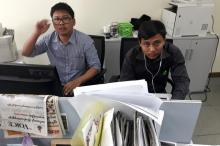 Reuters journalists Wa Lone (L) and Kyaw Soe Oo, who are based in Myanmar, pose for a picture at the Reuters office in Yangon, Myanmar, December 11, 2017. PHOTO BY REUTERS/Antoni Slodkowski