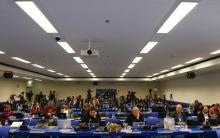 Journalists wait for the start of a news conference of Iranian Foreign Minister Mohammad Javad Zarif and the High Representative of the European Union for Foreign Affairs and Security Policy Federica Mogherini at the United Nations building in Vienna, Austria, January 16, 2016. PHOTO BY REUTERS/Leonhard Foeger