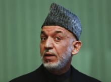 Afghan President Hamid Karzai speaks during a news conference in Kabul