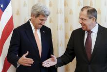 Russian Foreign Minister Sergei Lavrov (R) shakes hands with U.S. Secretary of State John Kerry during a meeting in Moscow, Russia, March 24, 2016. PHOTO BY REUTERS/Maxim Zmeyev