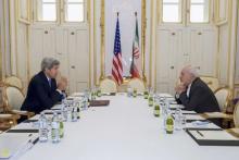 U.S. Secretary of State John Kerry (L) meets with Iranian Foreign Minister Javad Zarif at a hotel in Vienna, Austria, June 30, 2015. PHOTO BY REUTERS/State Department