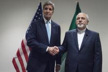 United States Secretary of State John Kerry (L) meets with Mohammad Javad Zarif, Minister of Foreign Affairs of Iran, at the United Nations in New York, September 26, 2015. PHOTO BY REUTERS/Stephanie Keith