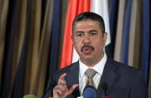 Yemen's newly appointed Prime Minister Khaled Bahah listens to a reporter's questions at a news conference after his cabinet was sworn-in at the Presidential Palace in Sanaa, November 9, 2014. PHOTO BY REUTERS/Mohamed al-Sayaghi