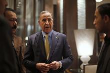 Iraqi Defence Minister Khaled al-Obeidi speaks to the media in Amman, December 22, 2014. PHOTO BY REUTERS/Muhammad Hamed