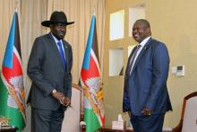 South Sudan's President Salva Kiir Mayardit and former vice president and rebel leader Riek Machar stand before their meeting about an attempt to form a unity government, in Juba, South Sudan, December 11, 2019. PHOTO BY REUTERS/Jok Solomun