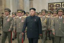North Korean leader Kim Jong Un (4th R) visits the Kumsusan Palace of the Sun to pay tribute to founding President Kim Il Sung and former leader Kim Jong Il to mark the 61st anniversary of the victory of the Korean people in the Fatherland Liberation War in Pyongyang