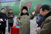 North Korean leader Kim Jong Un meets scientists and technicians in the field of researches into nuclear weapons in this undated photo released by North Korea's Korean Central News Agency (KCNA) in Pyongyang, March 9, 2016. PHOTO BY REUTERS/KCNA