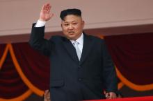 North Korean leader Kim Jong Un waves to people attending a military parade marking the 105th birth anniversary of country's founding father, Kim Il Sung in Pyongyang, April 15, 2017. PHOTO BY REUTERS/Damir Sagolj