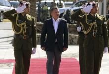 Jordan's King Abdullah (C) reviews an honour guard during a celebration to mark the centennial of the Arab Revolt against the region's then ruling Ottoman Turks, in Jordan's Red Sea port of Aqaba, January 23, 2016. PHOTO BY REUTERS/Raad Adayleh