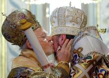 Ecumenical Patriarch Bartholomew I kisses Metropolitan Epifaniy, head of the Orthodox Church of Ukraine, as he hands the Tomos, a decree granting Ukraine church independence, after the Epiphany mass at the Patriarchal Cathedral of St. George in Istanbul, Turkey, January 6, 2019. PHOTO BY REUTERS/Murad Sezer