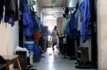 A labourer is pictured in a foreign workers dormitory in the Sanaya Industrial Area in Doha, during a government-guided tour, May 3, 2015. PHOTO BY REUTERS/Stringer
