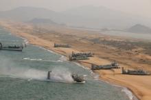 Landing and anti-landing exercises being carried out by the Korean People's Army (KPA) at an unknown location are seen in this undated photo released by North Korea's Korean Central News Agency (KCNA) in Pyongyang on March 20, 2016. PHOTO BY REUTERS/KCNA