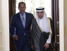 Russian Foreign Minister Sergei Lavrov (L) and Saudi Foreign Minister Adel al-Jubeir enter a hall during their meeting in Moscow, Russia, August 11, 2015. PHOTO BY REUTERS/Maxim Shemetov