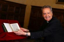Monsignor Cesare Pasini, chief of the Vatican Library, flips through a letter written by Christopher Columbus that had been stolen from its archives, returned by U.S. Homeland Security officials and American ambassador to the Vatican Library, at the Vatican, June 14, 2018. PHOTO BY REUTERS/Tony Gentile