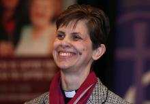 Libby Lane, a suffragan (Assistant) bishop in the Diocese of Chester, smiles as her forthcoming appointment as the new Bishop of Stockport is announced in the Town Hall in Stockport, northern England, December 17, 2014. PHOTO BY REUTERS/Phil Noble
