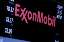 The logo of Exxon Mobil Corporation is shown on a monitor above the floor of the New York Stock Exchange in New York, December 30, 2015. PHOTO BY REUTERS/Lucas Jackson