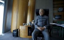 Malaysia's former prime minister Mahathir Mohamad poses for a photograph following an interview with Reuters at his desk in Petronas Towers, Kuala Lumpur, Malaysia, October 22, 2015. PHOTO BY REUTERS/Olivia Harris