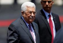 Palestinian President Mahmoud Abbas stands during a reception ceremony for Jordan's King Abdullah II in the West Bank city of Ramallah, August 7, 2017. PHOTO BY REUTERS/Mohamad Torokman