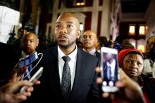 Leader of the Democratic Alliance Mmusi Maimane speaks with members of the media after leaving President Jacob Zuma's State of the Nation Address (SONA) to a joint sitting of the National Assembly and the National Council of Provinces in Cape Town, South Africa, February 9, 2017. PHOTO BY REUTERS/Nic Bothma