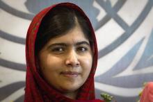 Pakistani schoolgirl activist Malala Yousafzai poses for pictures during a photo opportunity at the United Nations in the Manhattan borough of New York