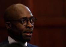 South Africa's new finance minister, Malusi Gigaba looks on after the swearing in of cabinet ministers following a reshuffle that replaced Pravin Gordhan as finance minister with Gigaba along with various other ministers and their deputies in Pretoria, South Africa, March 31,2017. PHOTO BY REUTERS/Siphiwe Sibeko