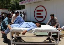 A man is transported to a hospital on a gurney after a car bomb attack in Lashkar Gah, Helmand province, Afghanistan, June 22, 2017. PHOTO BY REUTERS/Abdul Malik