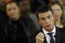 French Prime Minister Manuel Valls attends a news conference to announce that he is a candidate for January's Socialist presidential primary at the town hall in Evry, near Paris, France, December 5, 2016. PHOTO BY REUTERS/Christian Hartmann