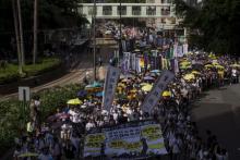 Thousands of pro-democracy protesters stage a march to demand universal suffrage in Hong Kong, China, July 1, 2015. PHOTO BY REUTERS/Tyrone Siu