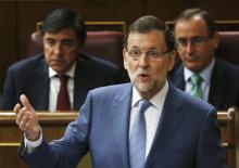 Spain's Prime Minister Mariano Rajoy answers a question during the weekly control session at parliament in Madrid