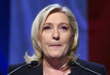 Marine Le Pen, French National Front (FN) political party leader and candidate for the National Front in the Nord-Pas-de-Calais-Picardie region, reacts after results in the second-round the regional elections are announced in Henin-Beaumont, France, December 13, 2015. PHOTO BY REUTERS/Yves Herman