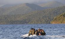 Members of the Philippine marines are transported on a rubber boat from a patrol ship after conducting a mission on the disputed Second Thomas Shoal, part of the Spratly Islands in the South China Sea, as they make their way to a naval forces camp in Palawan province, southwest Philippines