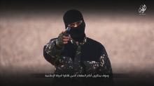 A masked man points a weapon as he speaks in this still image from a handout video obtained on January 4, 2016 from a social media website which has not been independently verified. PHOTO BY REUTERS/Social Media via Reuters