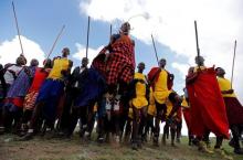 Maasai moran athletes sing and jump in their traditional style as they prepare for the 2016 Maasai Olympics at the Sidai Oleng Wildlife Sanctuary, at the base of Mt. Kilimanjaro, near the Kenya-Tanzania border in Kimana, Kajiado, Kenya December 10, 2016. PHOTO BY REUTERS/Thomas Mukoya