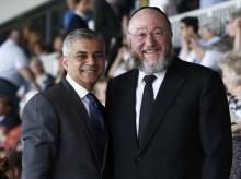 London's newly elected mayor Sadiq Khan (L) stands with Britain's Chief Rabbi Ephraim Mirvis at a holocaust commemoration ceremony at a rugby stadium in north London, May 8, 2016. PHOTO BY REUTERS/Peter Nicholls