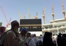 Cranes are seen as Muslim pilgrims perform Haj tasks in the Grand Mosque in the Muslim holy city of Mecca, Saudi Arabia, September 12, 2015. PHOTO BY REUTERS/Mohamed Al Hwaity