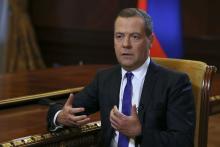 Russian Prime Minister Dmitry Medvedev speaks during an interview with Russia's Kommersant newspaper at the Gorki state residence outside Moscow, Russia, August 7, 2018. PHOTO BY REUTERS/Sputnik/Ekaterina Shtukina/Pool