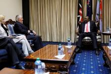 Kenya's President Uhuru Kenyatta (R) greets U.S. Secretary of State Rex Tillerson, flanked by his chief of staff Margaret Peterlin (L), at the State House in Nairobi, Kenya, March 9, 2018. PHOTO BY REUTERS/Jonathan Ernst
