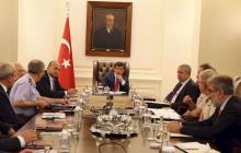 Turkey's Prime Minister Ahmet Davutoglu (C) chairs a security meeting in Ankara, Turkey, in this July 25, 2015 handout provided by Turkey's Prime Minister's Press Office. PHOTO BY REUTERS/Hakan Goktepe