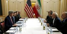 U.S. Secretary of State John Kerry (L) meets with Iranian Foreign Minister Mohammad Javad Zarif on what is expected to be "implementation day," the day the International Atomic Energy Agency (IAEA) verifies that Iran has met all conditions under the nuclear deal, in Vienna, January 16, 2016. PHOTO BY REUTERS/Kevin Lamarque