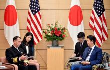 Admiral John Richardson (L), Chief of U.S. Naval Operations, speaks to Japan's Prime Minister Shinzo Abe (R) at the start of their meeting at the Prime Minister's official residence in Tokyo, Japan, 18 December 2017. PHOTO BY REUTERS/Franck Robichon