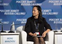 Meng Wanzhou, Executive Board Director of the Chinese technology giant Huawei, attends a session of the VTB Capital Investment Forum "Russia Calling!" in Moscow, Russia, October 2, 2014. PHOTO BY REUTERS/Alexander Bibik