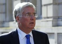 Britain's Defence Secretary Michael Fallon arrives for a Cobra meeting at the Cabinet Office in London, October 8, 2014. PHOTO BY REUTERS/Luke MacGregor