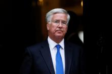 Britain's Secretary of State for Defence Michael Fallon leaves after attending a cabinet meeting at Number 10 Downing Street in London, Britain, September 8, 2015. PHOTO BY REUTERS/Stefan Wermuth