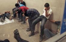 Immigrants who have been caught crossing the border illegally are housed inside the McAllen Border Patrol Station in McAllen, Texas, in this file photo taken July 15, 2014. PHOTO BY  REUTERS/ Rick Loomis