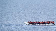 Migrants wait to be rescued by "Save the Children" NGO crew from the ship Vos Hestia in the Mediterranean sea off Libya coast, June 18, 2017. PHOTO BY REUTERS/Stefano Rellandini