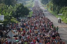 A caravan of thousands of migrants from Central America walk towards Tapachula from Ciudad Hidalgo while en route to the United States, in Frontera Hidalgo, Mexico, October 21, 2018. PHOTO BY REUTERS/Adrees Latif