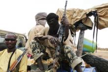 Militiaman from the Ansar Dine Islamic group sit on a vehicle in Gao in northeastern Mali, in a file photo. PHOTO BY REUTERS/Adama Diarra
