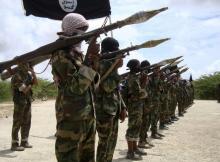 Al Shabaab militants parade new recruits after arriving in Mogadishufrom their training camp south of the capital in this October 21, 2010 file photo. PHOTO BY REUTERS/Feisal 