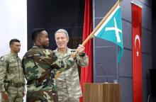 Turkish military chief of staff General Hulusi Akar and a Somali soldier participate during the opening ceremony of a Turkish military base in Mogadishu, Somalia, September 30, 2017. PHOTO BY REUTERS/Feisal Omar
