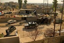 A military vehicle of the Iraqi Counter Terrorism Service drives in al-Zahraa neighborhood during a fight with Islamic State in Mosul, Iraq, Novemebr 13, 2016. PHOTO BY REUTERS/Ahmad Jadallah